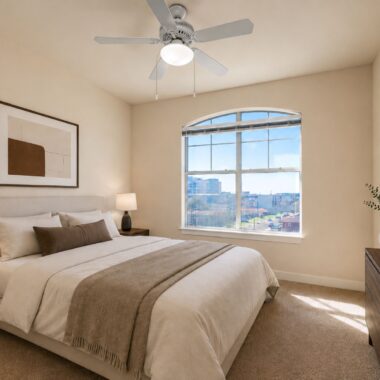 Crescent Club Bedroom with Arch Window, Bed, Nightstands, and Dresser in Neutral Palette