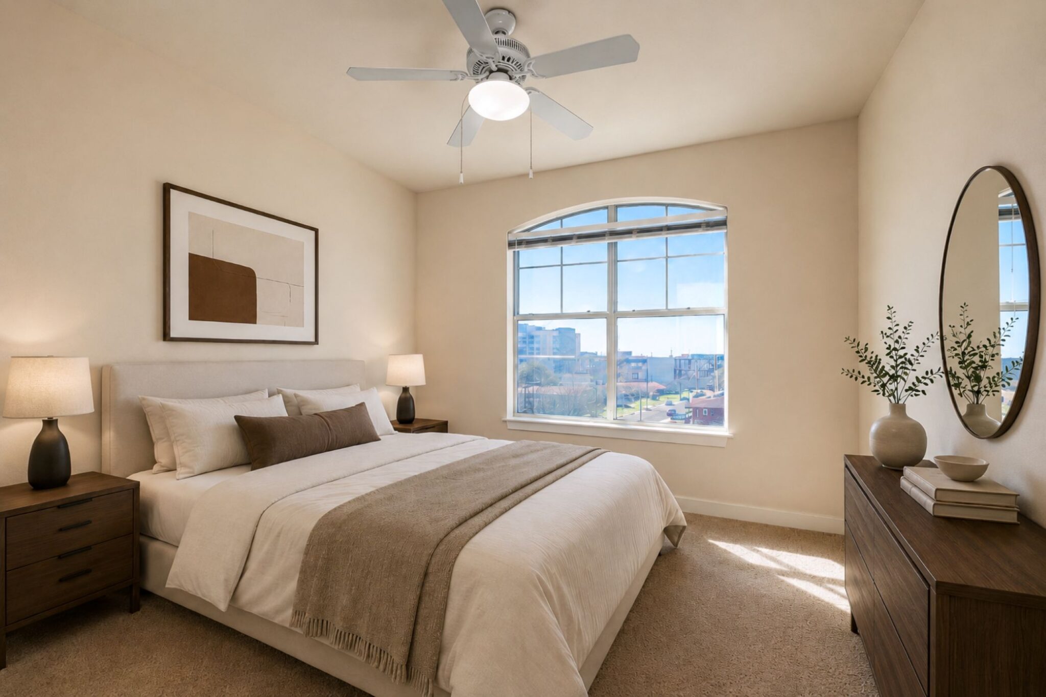 Crescent Club Bedroom with Arch Window, Bed, Nightstands, and Dresser in Neutral Palette